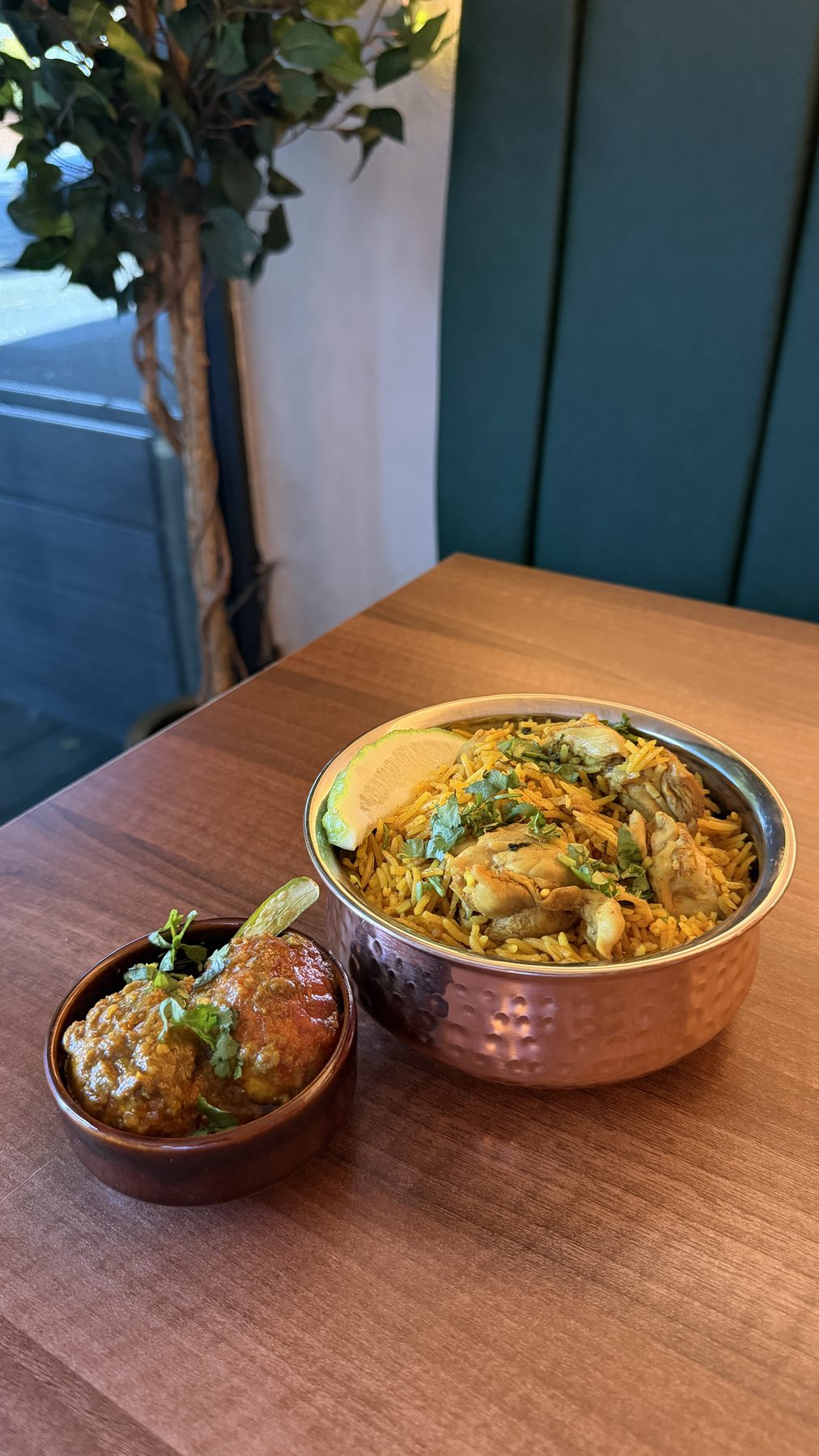 Akhni Fulab — fragrant spiced chicken rice served with egg bhuna and raita