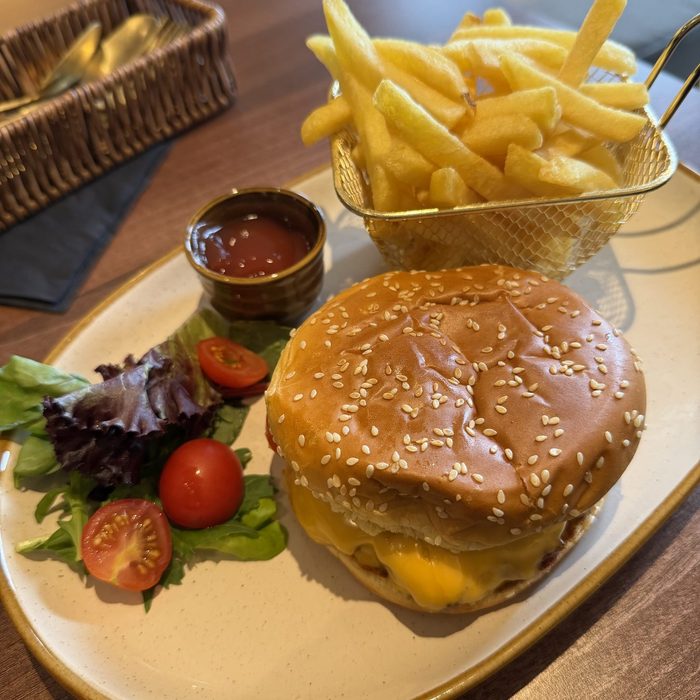 Smashed burger and fries at Chaya Cafe